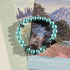 Aqua Blue Glass Beaded Bracelet: Pearl-Like Butterfly Charm