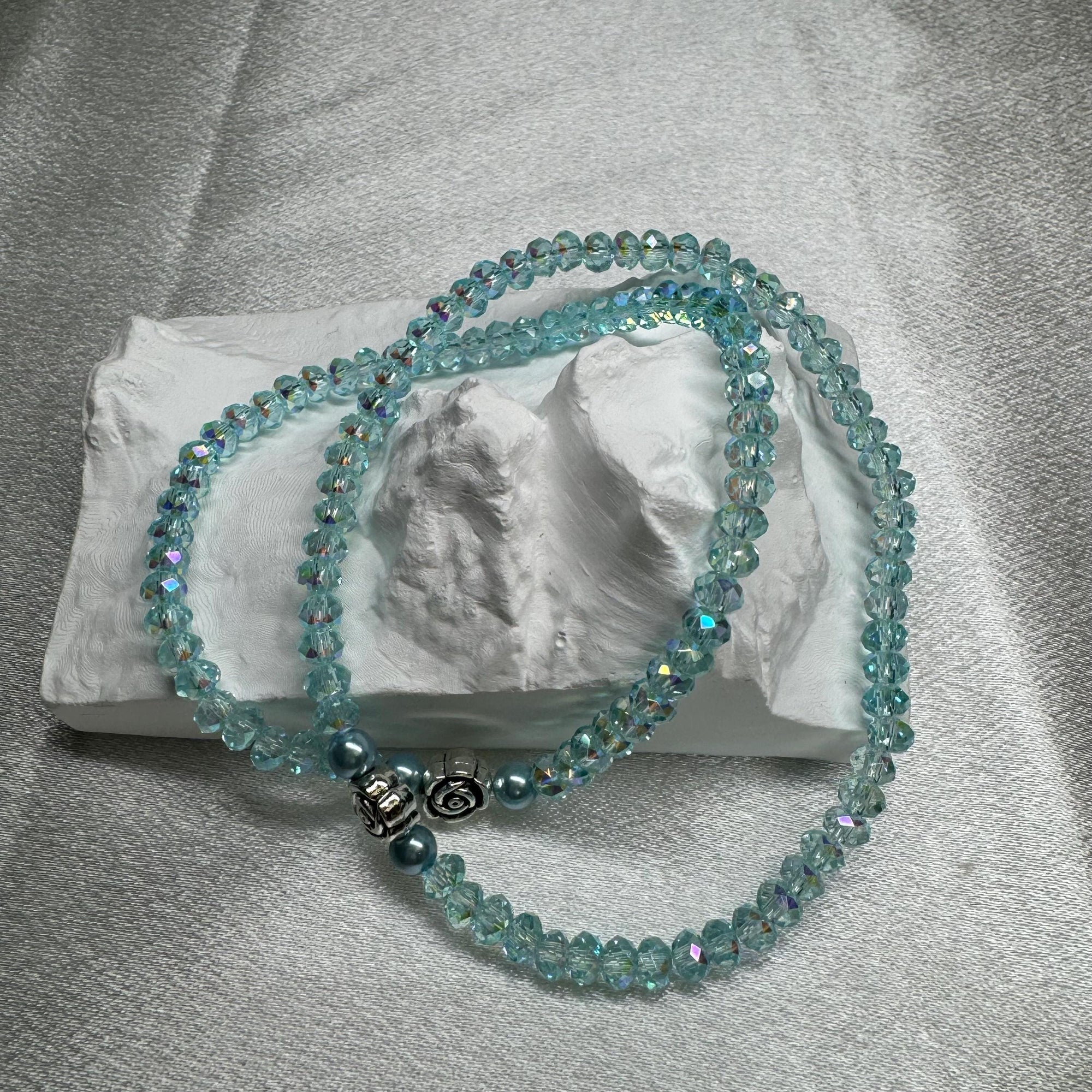 Aqua Blue Glass Beaded Bracelet: Pearl-Like Butterfly Charm