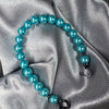 Aqua Blue Glass Beaded Bracelet: Pearl-Like Butterfly Charm